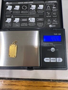 5g credit suisse pure 18k gold pendant